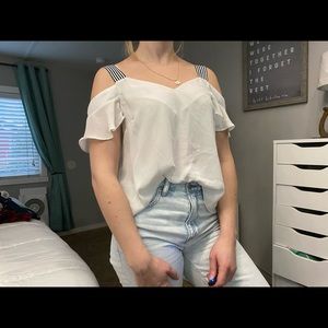 white cold shoulder blouse with ruffled sleeves